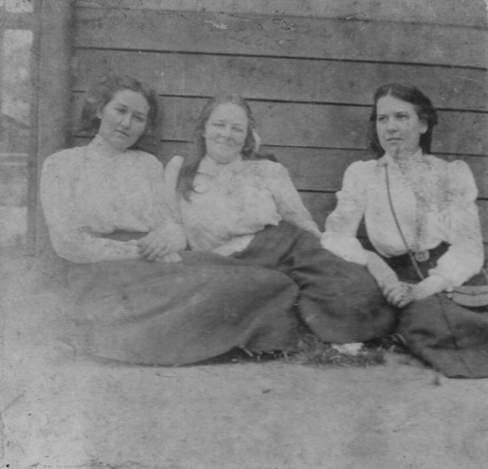Photograph of three students including Bessie McLaughlin, 1910