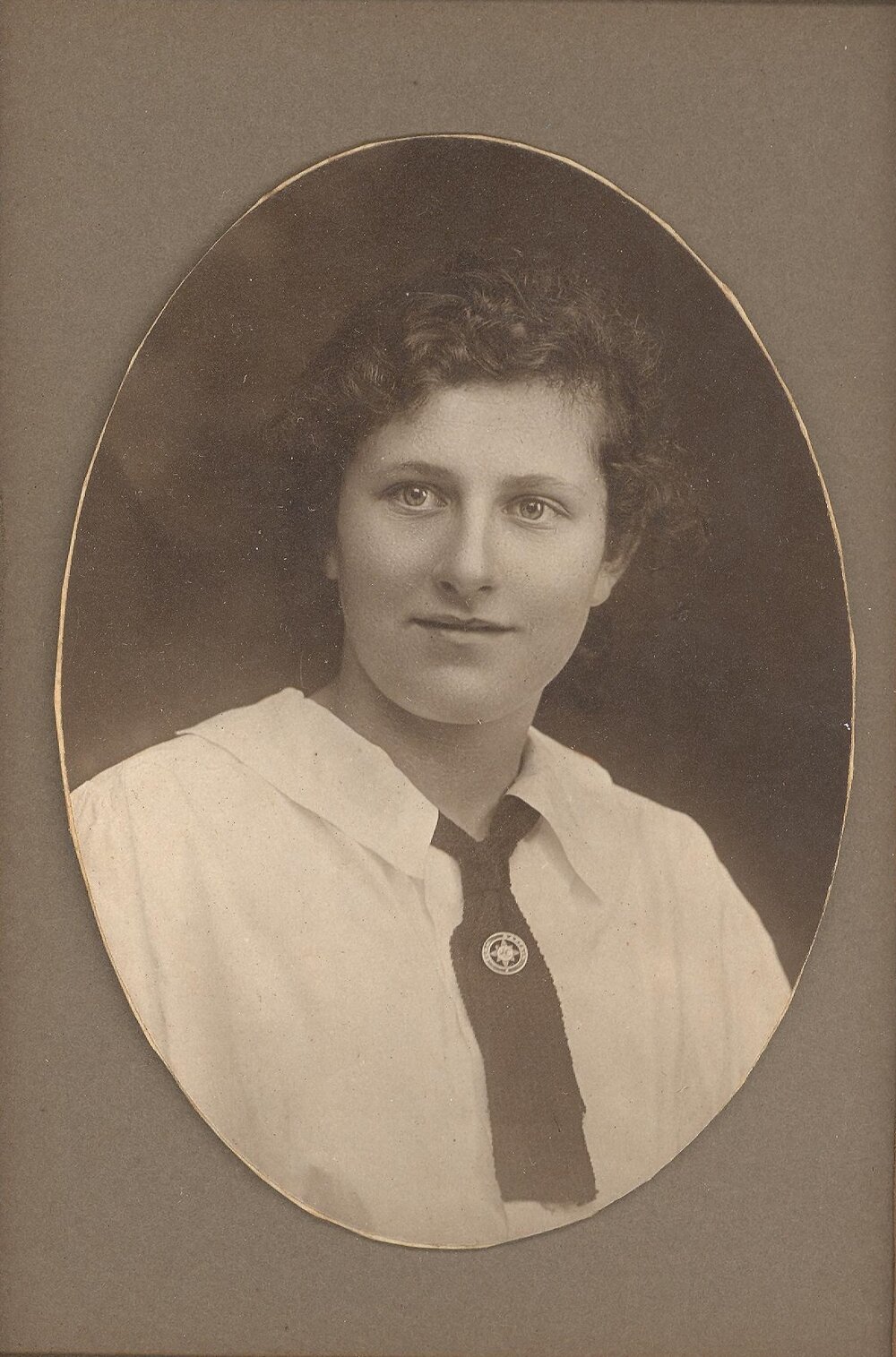 Photograph of Barbara Isobel Thornton wearing Form Captain badge, c.1916