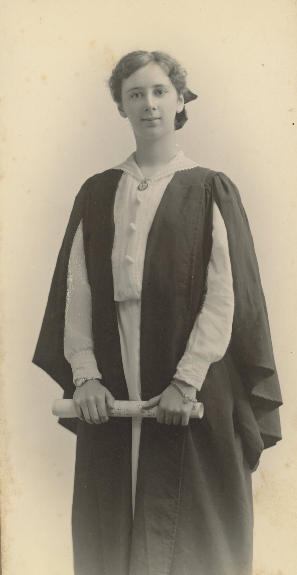 Photo of Ivy Comben, possibly following tertiary graduation, 1917