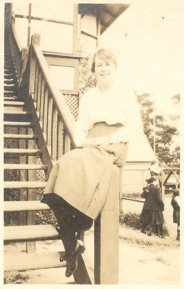 Photo of friend of Winnie Woodmason in quad area, c.1917