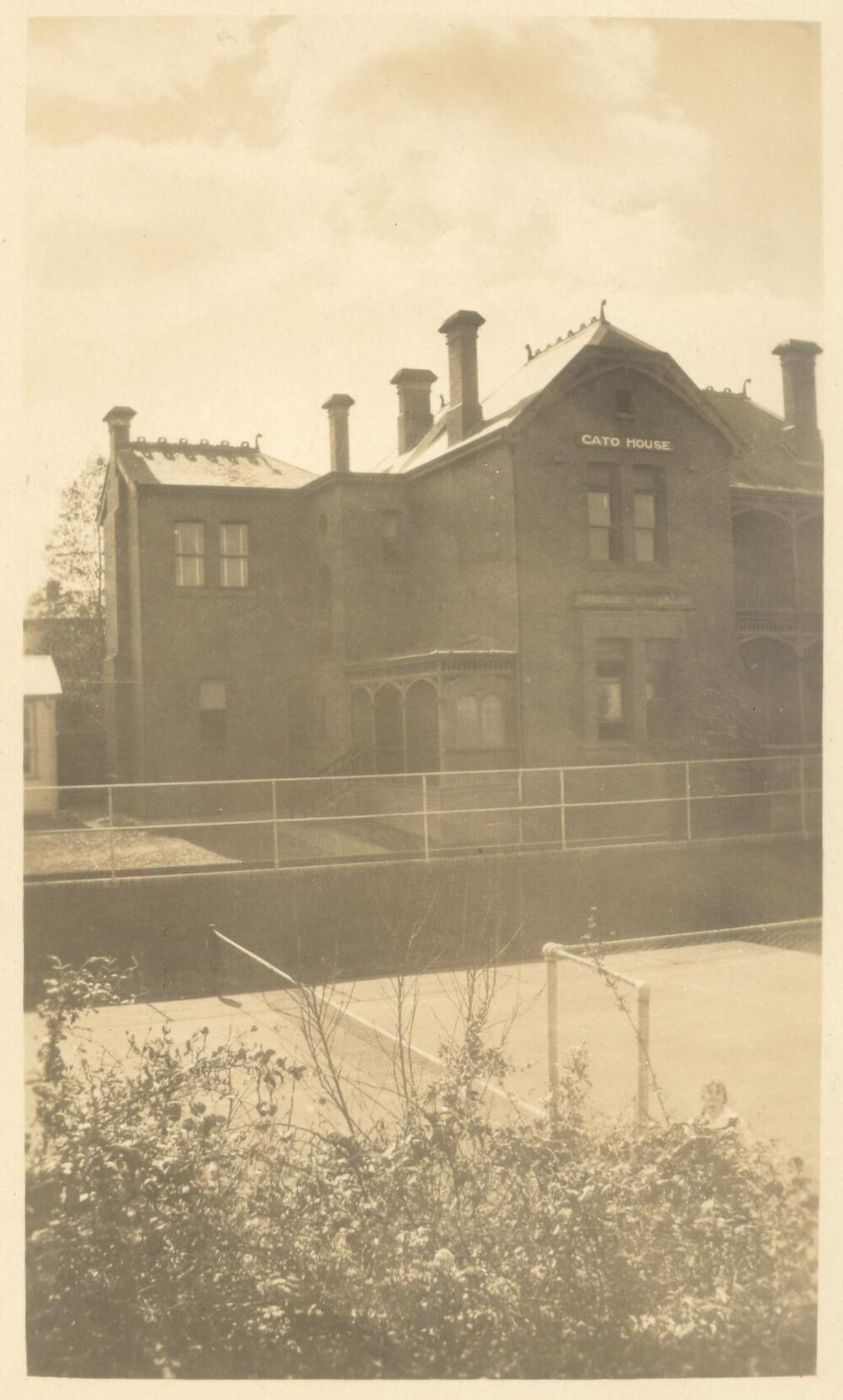Photo of Cato House showing portion of Tennis Courts, c.1925-1926