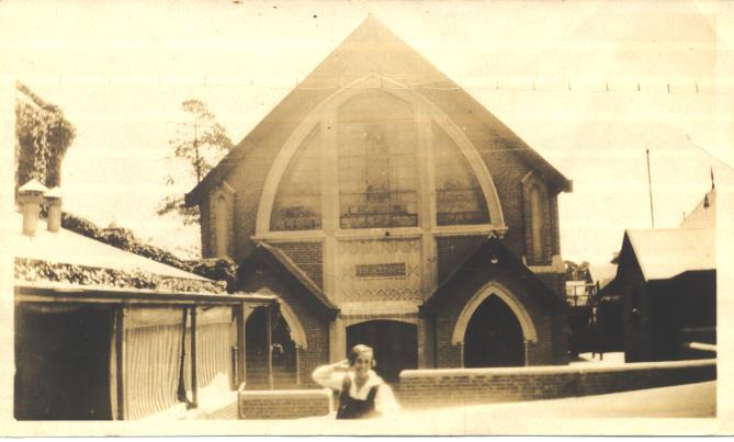 Betty Schofield in front of Fitchett Hall, 1927