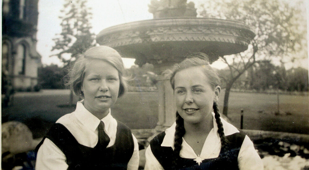 Photo of two students at fountain, 1932 or 1933