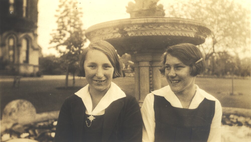 Photo of students Olive Spicer and Jean Carne at fountain, 1932 or 1933