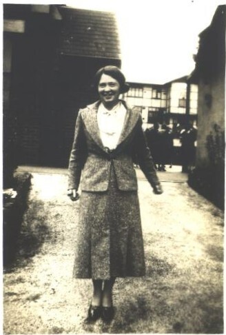 Photograph of teacher, Miss Macdonald, standing in Quad,1886