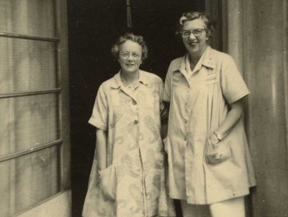 Photo of Betty Lardner and Elsa Tyler, circa 1940s, standing in doorway