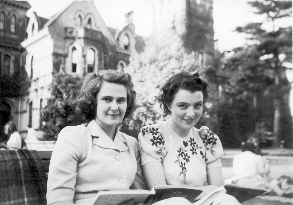 Photo of Gay Cotton with other boarder wearing summer clothes on front gardens, c.1941