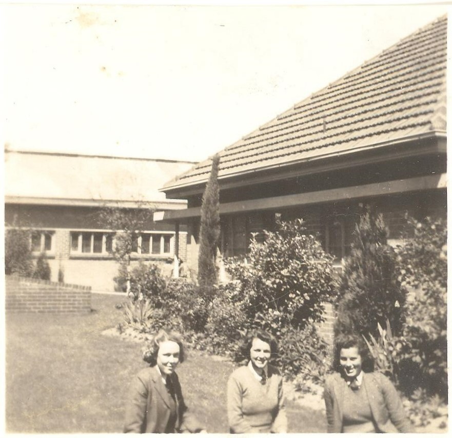 Photo of Ruth Pretty, Gwenda Jenkin and Pat Weymouth in front of MLC hospital, 1945