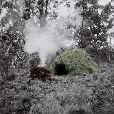 Un-resettling (Dome hut with stone wind break)