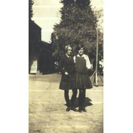 Cecile Goldie and Unidentified in front of Baths Building, 1927