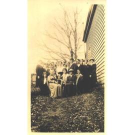 Staff group photographed near School Hospital, 1914