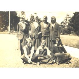 Students in group near flag pole, ca1924, including Alva Phillips