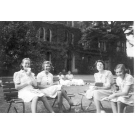 Photo of Dot Dungey, Mary Richards, Phyl Trewhella, Joy Andrews, in front gardens, 1941