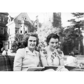 Photo of Gay Cotton with other boarder wearing summer clothes on front gardens, c.1941