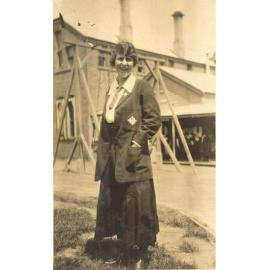 Photo of Winifred Woodmason wearing sports blazer on MLC grounds, c.1917