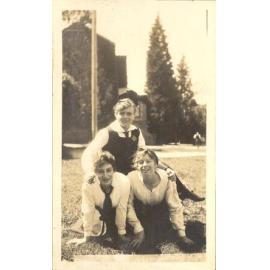 Photo of three students posing on front lawn, c.1917 (Woodmason donation)