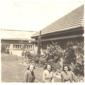 Photo of Ruth Pretty, Gwenda Jenkin and Pat Weymouth in front of MLC hospital, 1945