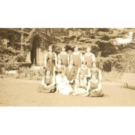 Photo of 12 girls on front lawn, c.1925-26