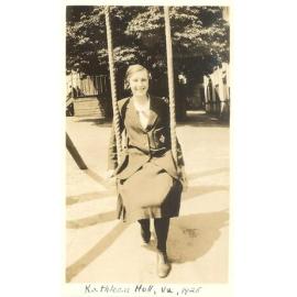 Photo of Kathleen Hull sitting on swing in quad, Form Va, 1925
