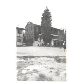 Baths Building showing foreground and students in quad, 1925-1926