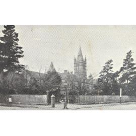 Photo of wooden fence around MLC from corner Barkers and Glenferrie, pre-1923, from postcard