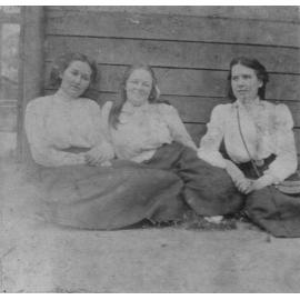 Photograph of three students including Bessie McLaughlin, 1910