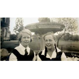 Photo of two students at fountain, 1932 or 1933