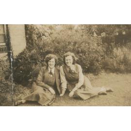Photo of Margaret Rentoul & Barbara Binder sitting on grass, 1943