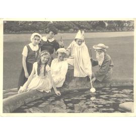 Photo of students, including Noni Rentoul in costume for Shakespeare Day at fountain, 1937