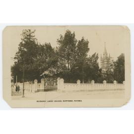 Photographic postcard showing Krome Gates, wall, elms and MLC Tower, c.1926-28.
